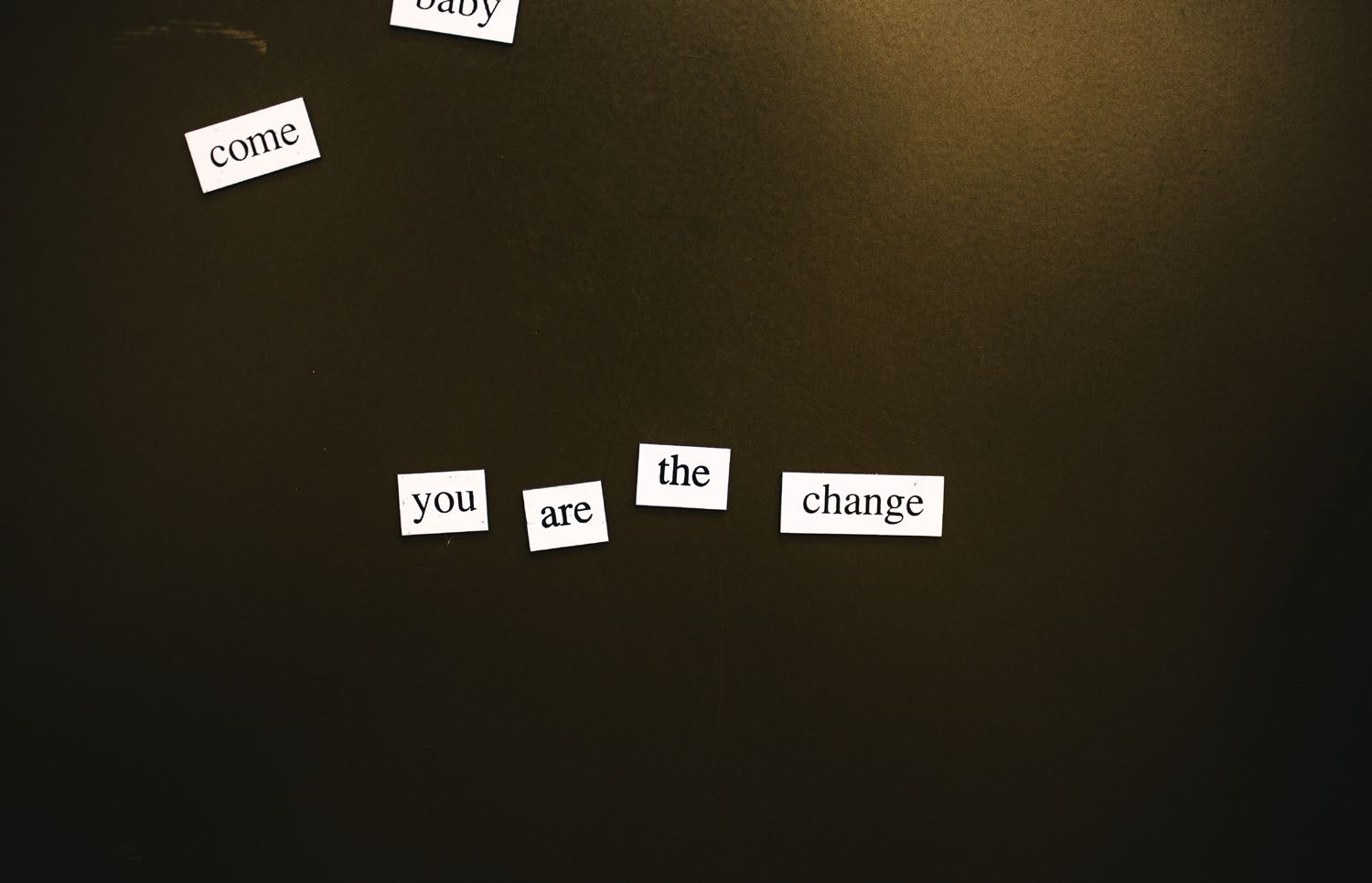 Photo of words saying you are the change
