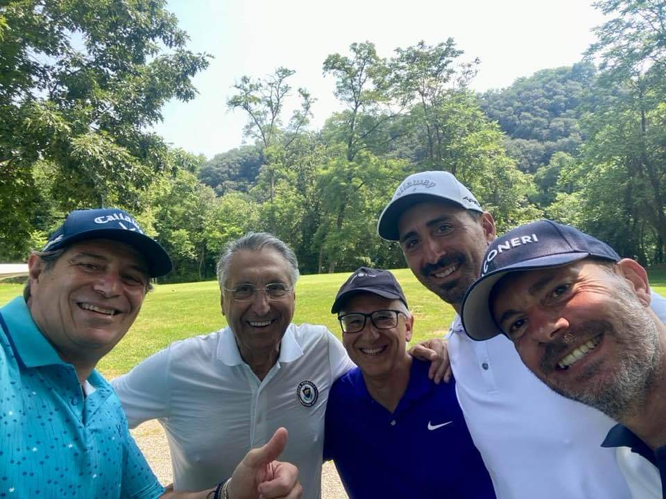 Giancarlo with his golf team