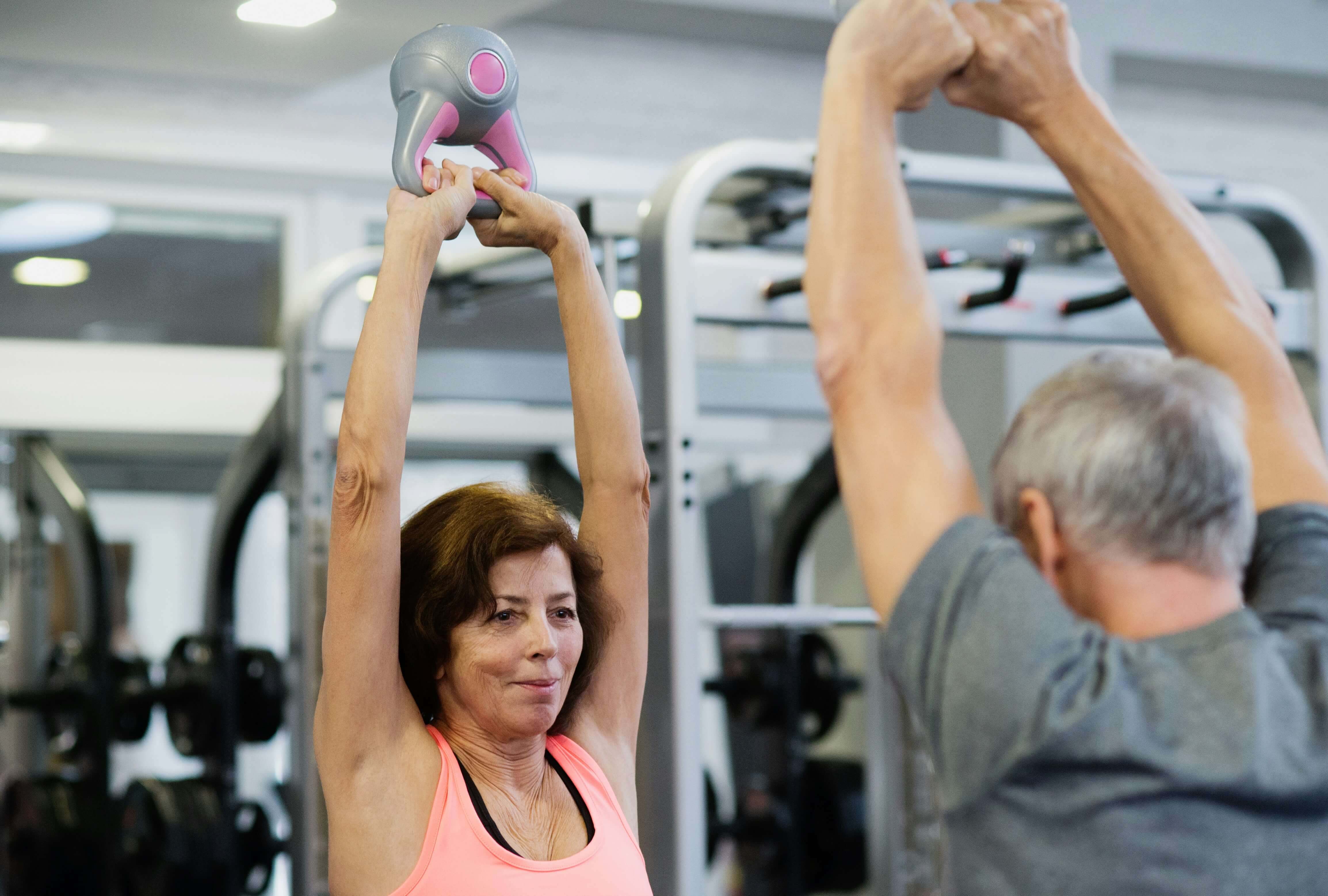 Woman using kettle bells