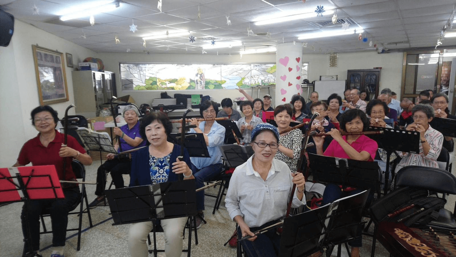 Ms. Liuo playing with her band