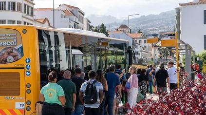 A bus in Madeira with people of all ages