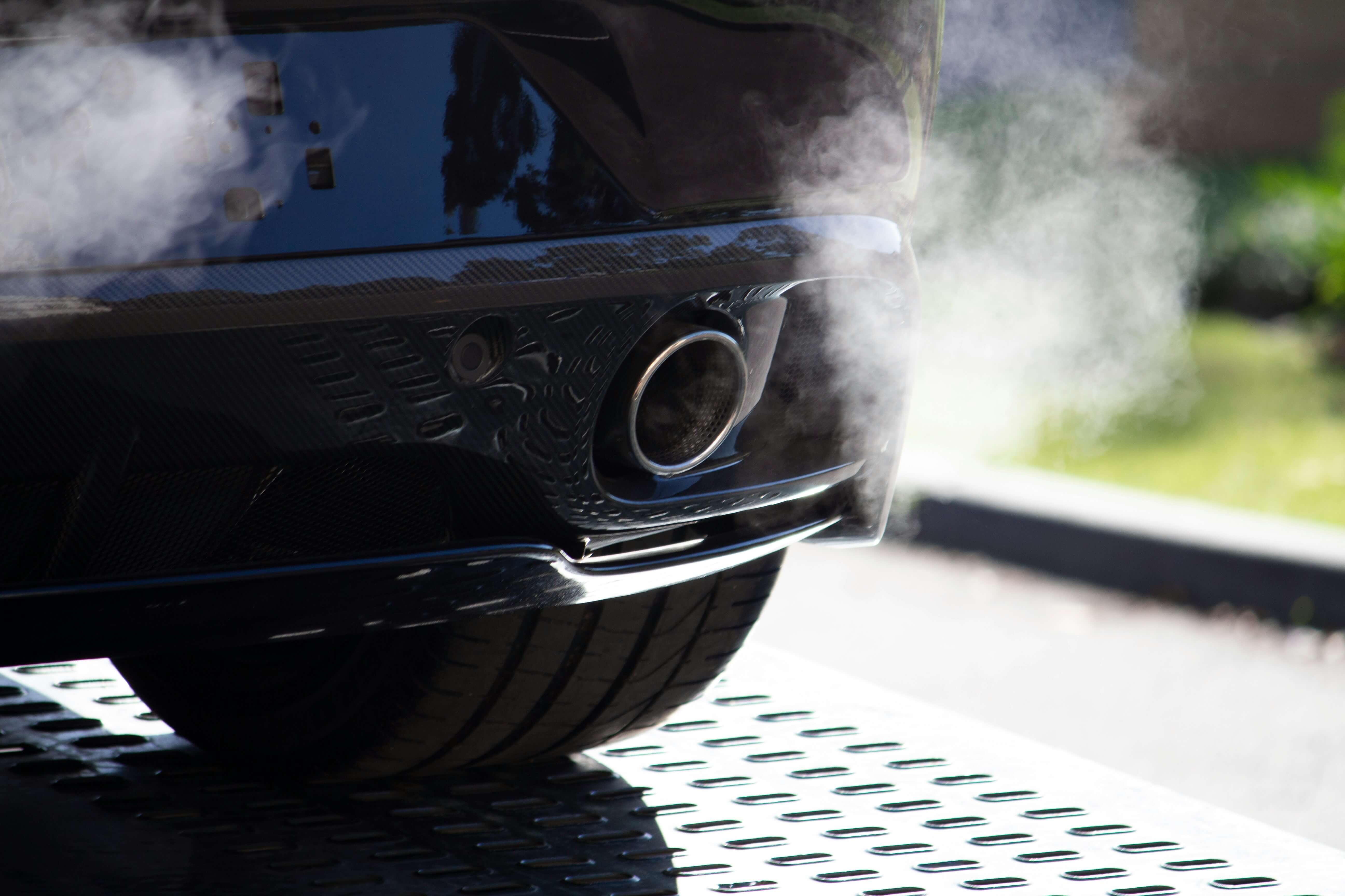 A car's exhaust pumping out emissions