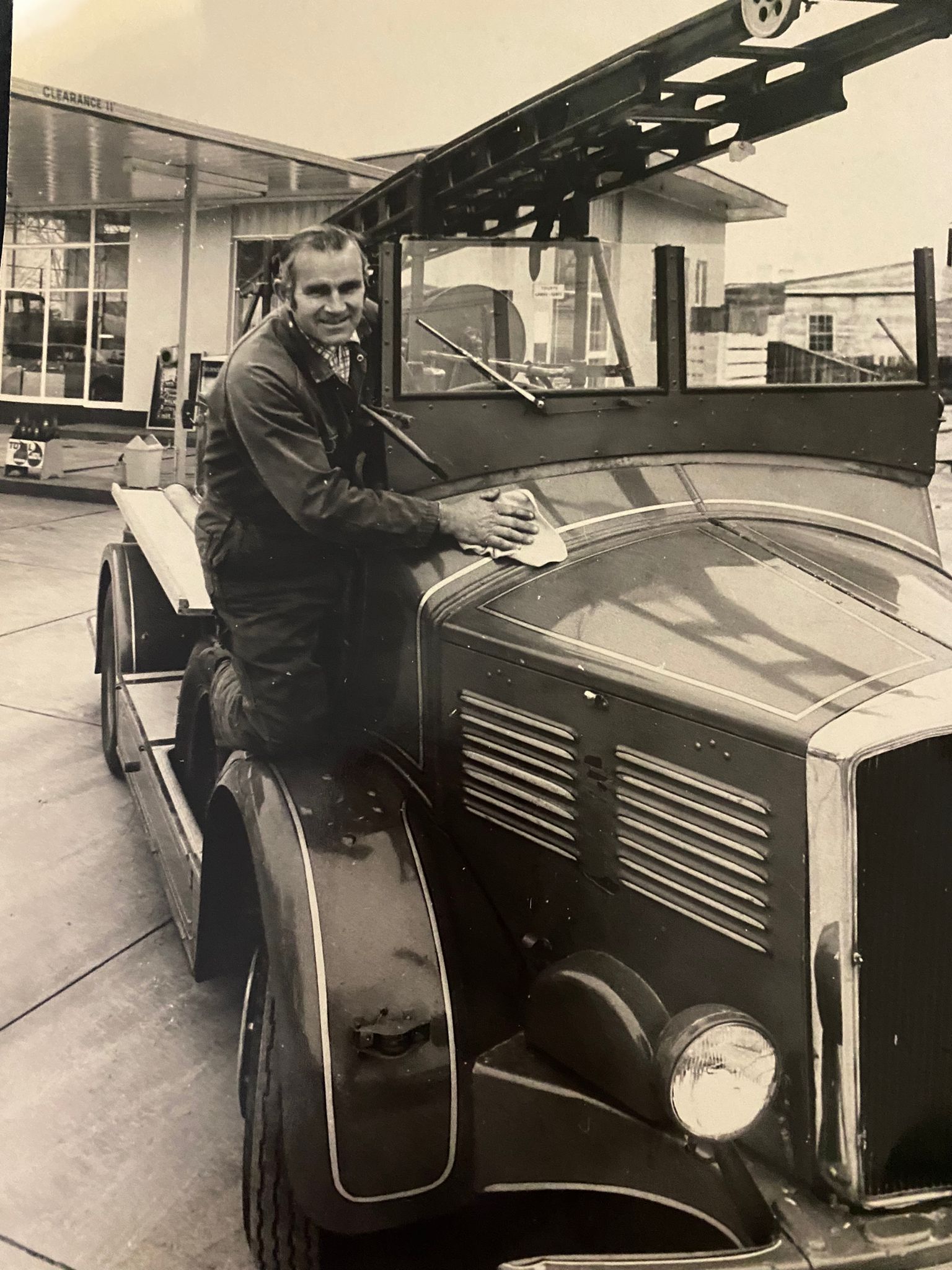 Harold as a young man polishing a car