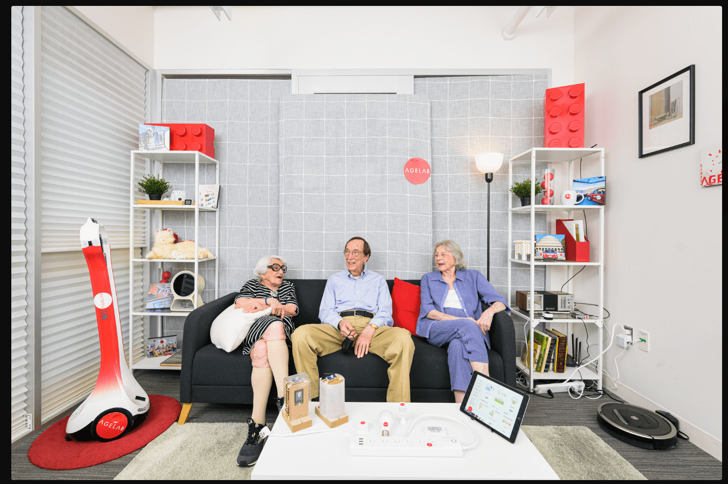 Older people sitting on a sofa in MIT's Age Lab