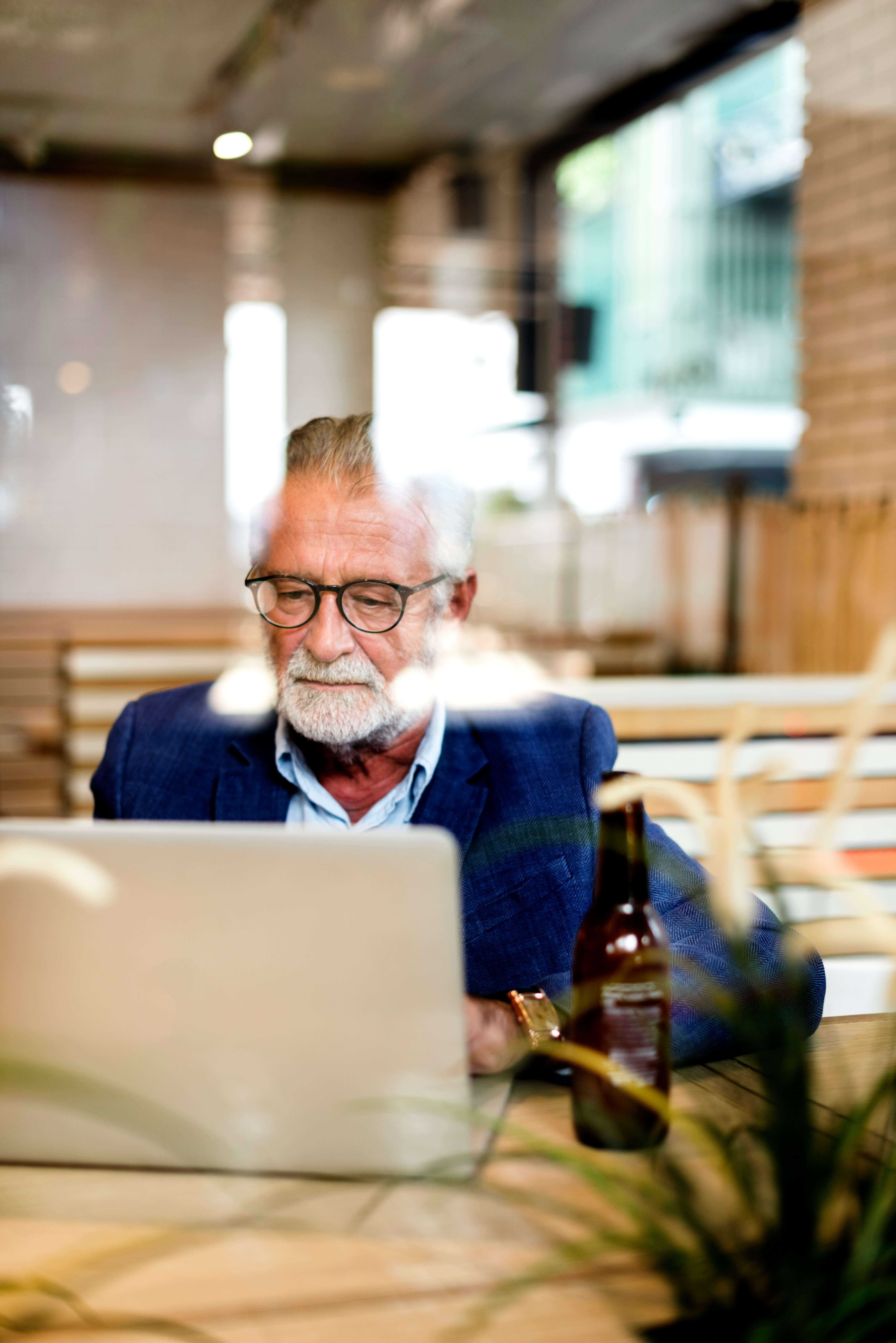 Older man working at his computer