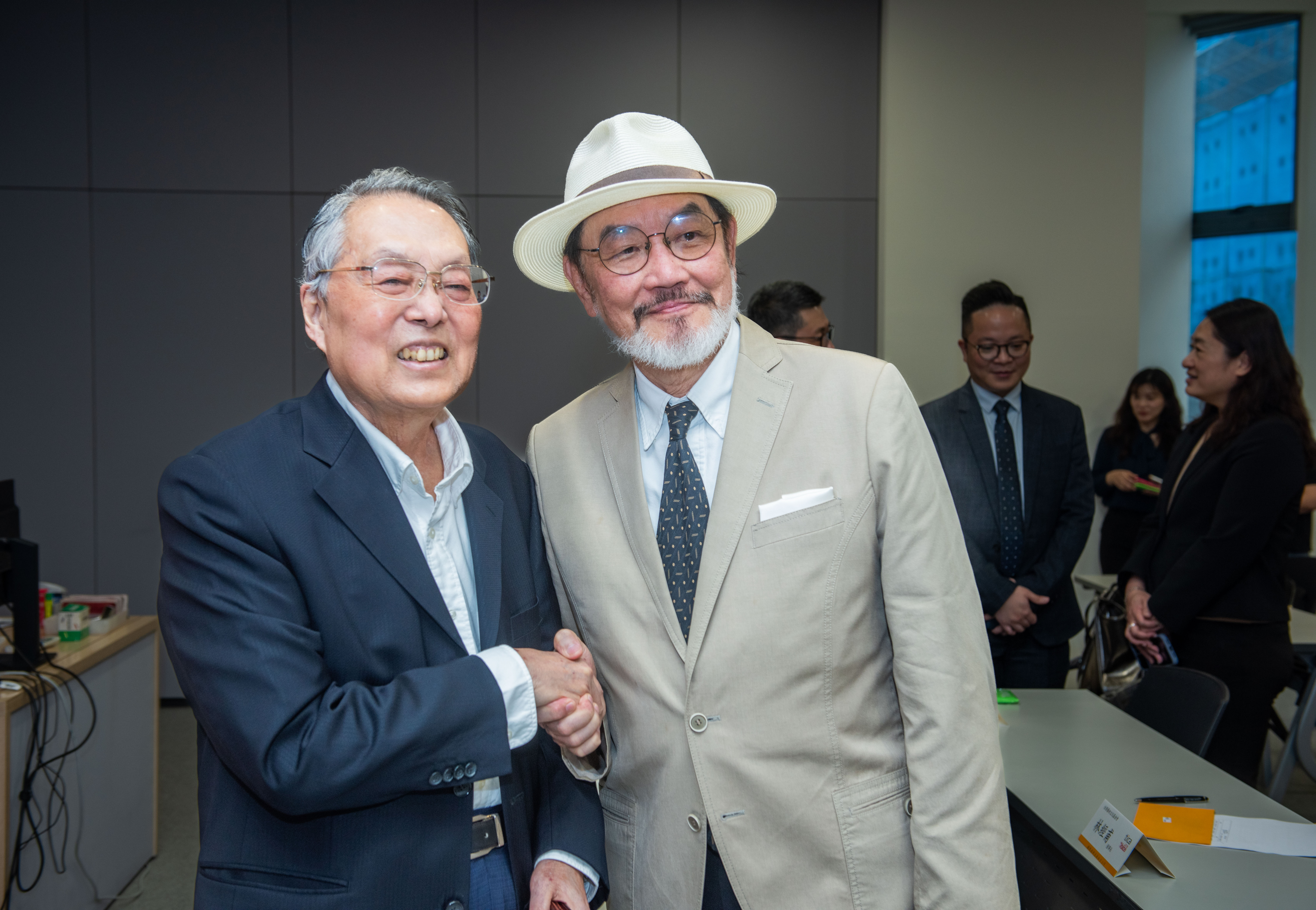 Dr. Lin at a business conference