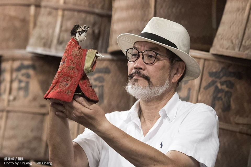 Dr. Lin holding a puppet