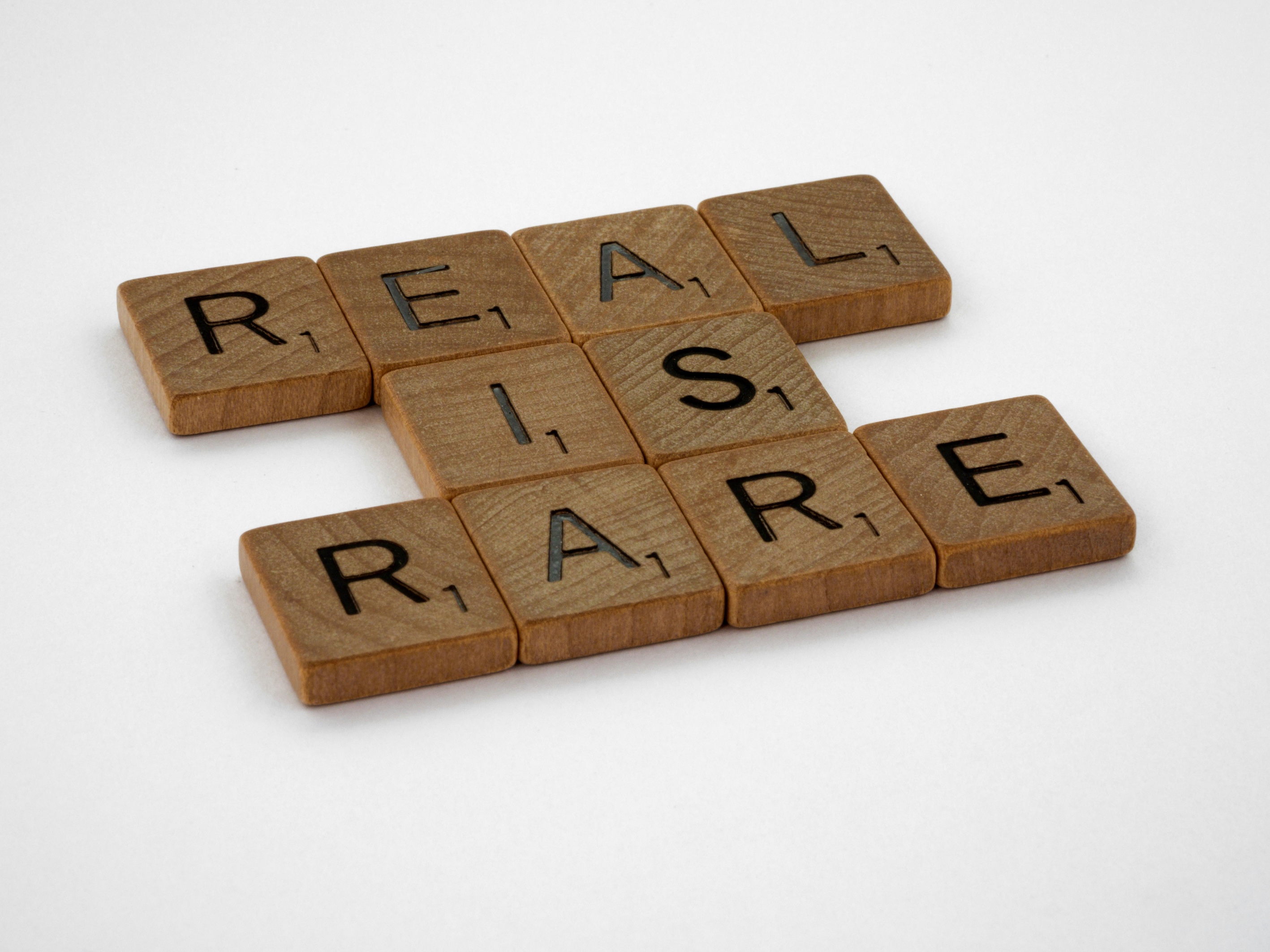 Scrabble letters reading real is rare
