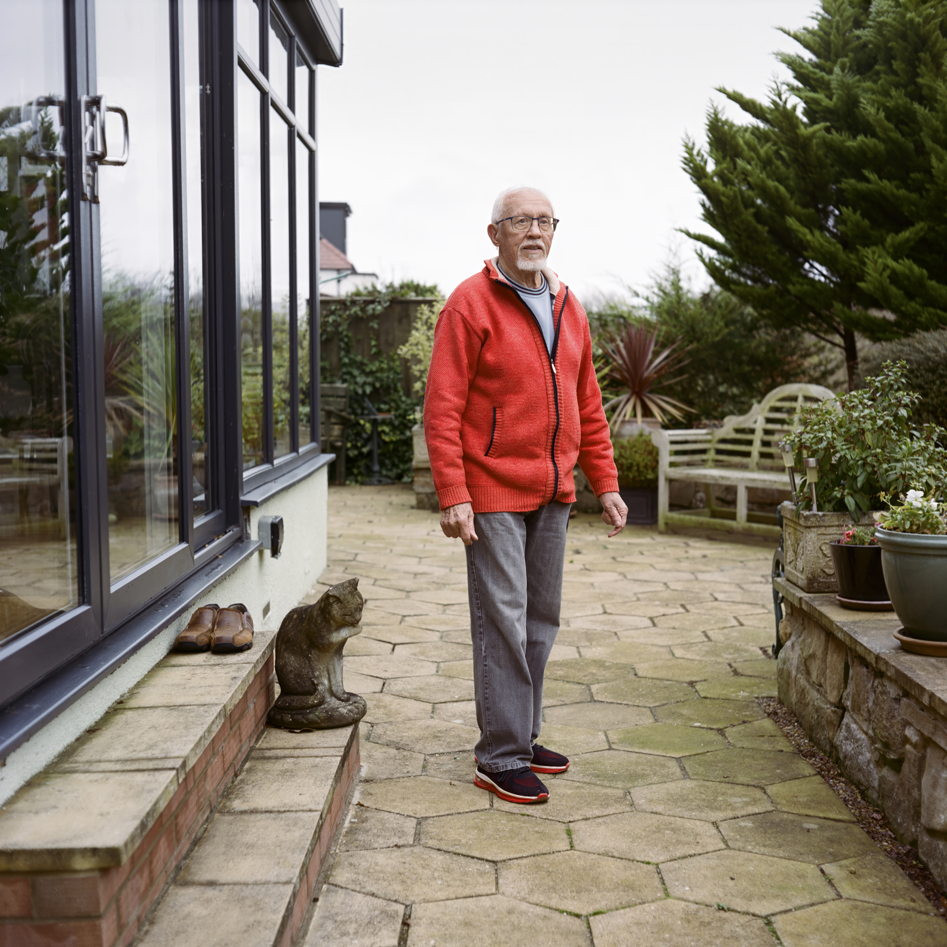 Don standing in his garden.