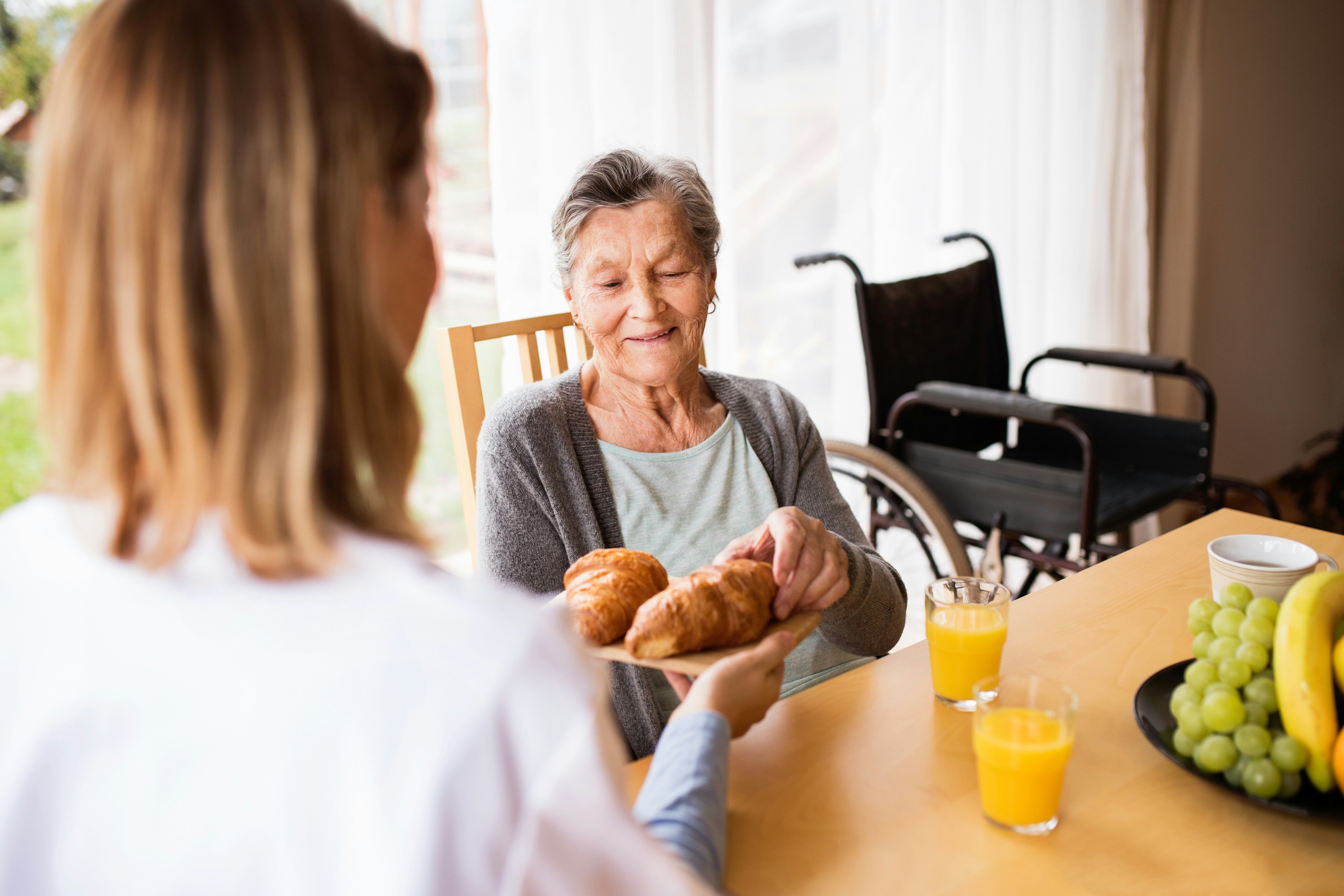 Older woman having breakfast