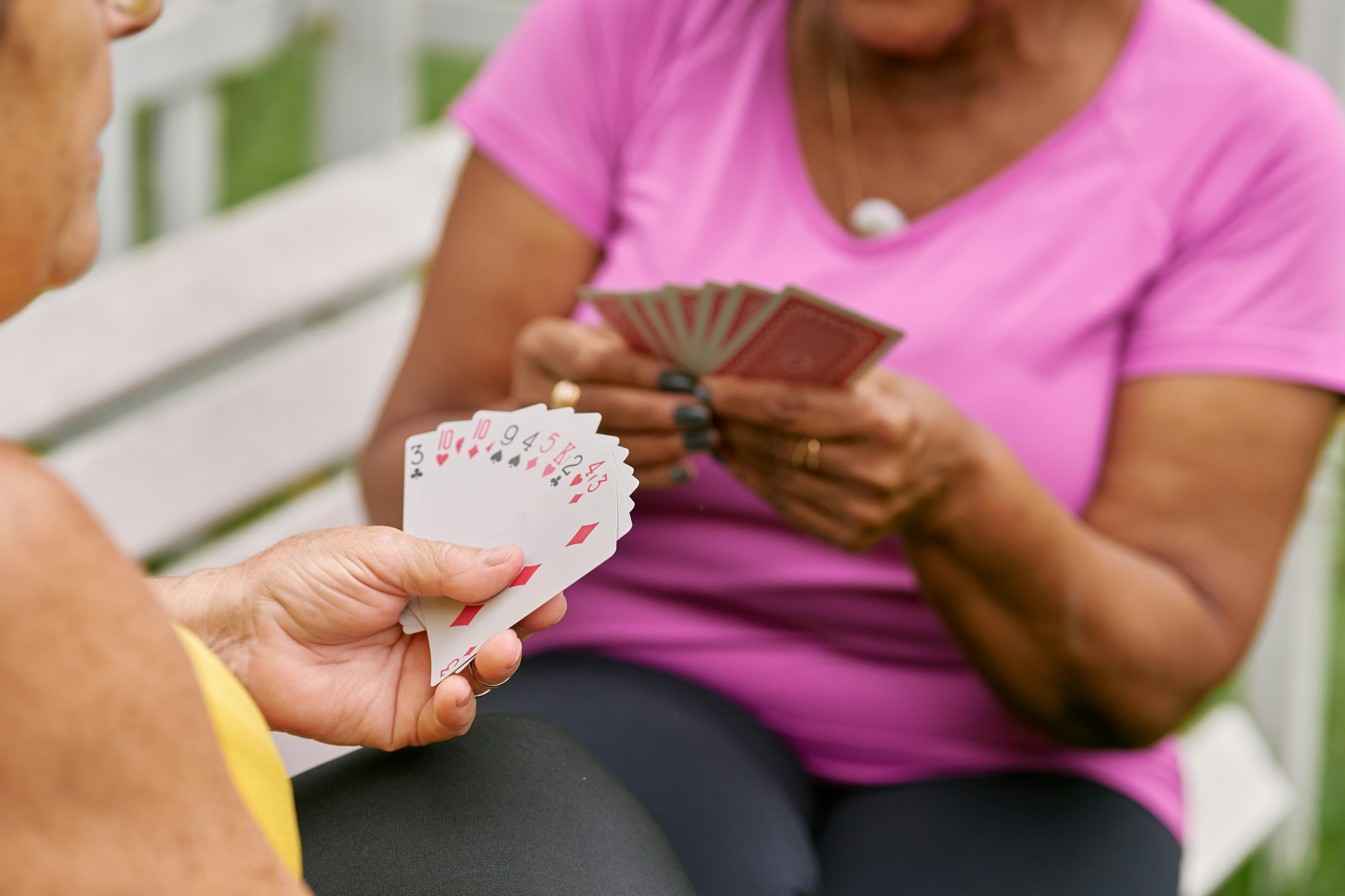 Two women playing cards